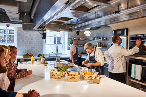 Chefs at work and customers watching at Fortnum & Mason Food & Drink Studio